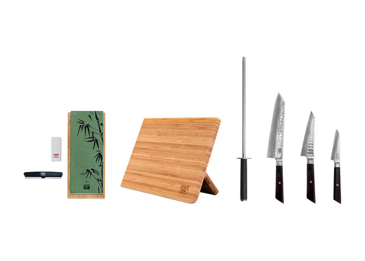 6-Piece Essential Bunka Damascus knife set with patterned AUS-10 steel blades and ebony handles.