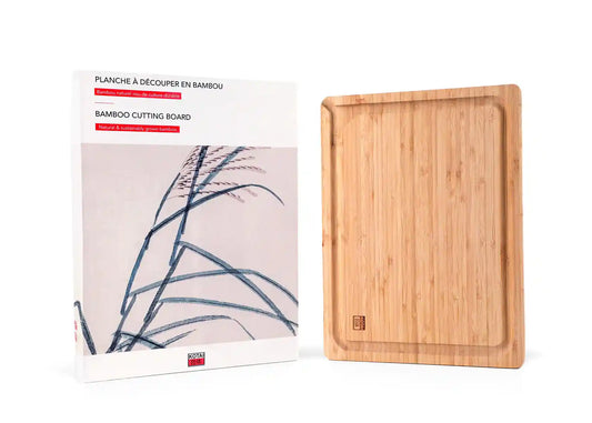 Rectangular bamboo cutting board with smooth double-sided surface.