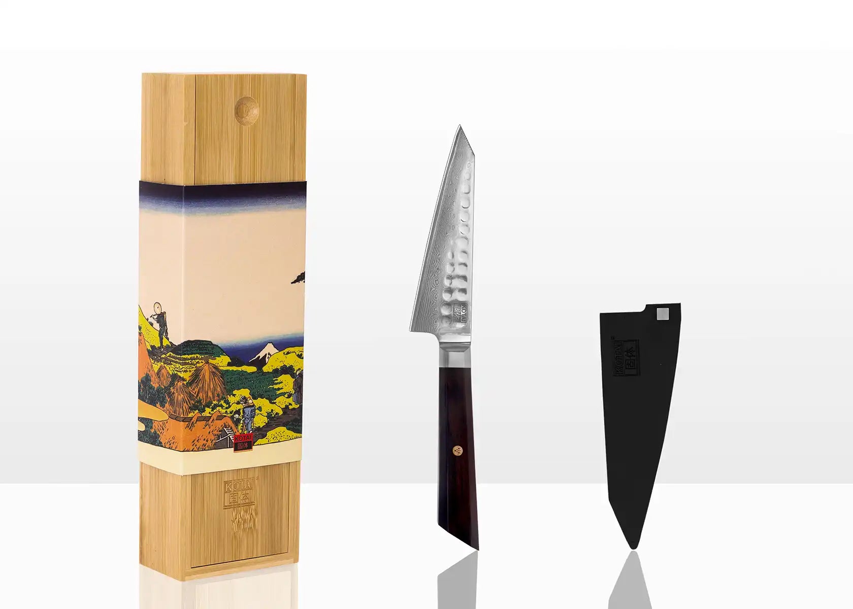 13.5 cm Petty knife with AUS-10 Damascus blade and ebony handle.