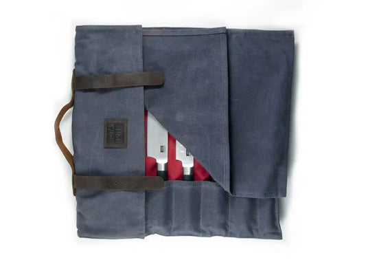 Canvas and leather roll-up knife bag for up to seven knives and steel.