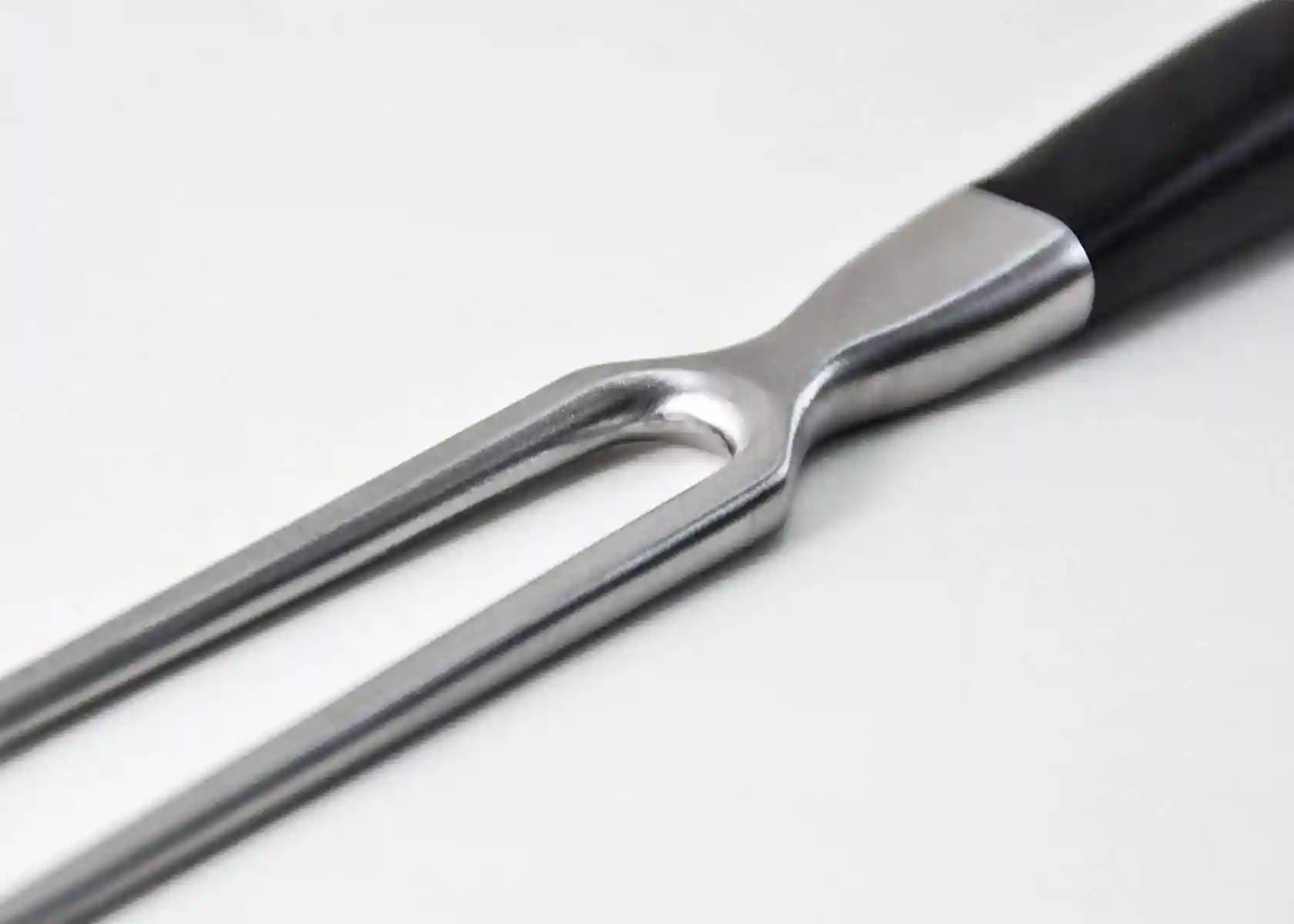 29 cm stainless steel carving fork with dual tines.