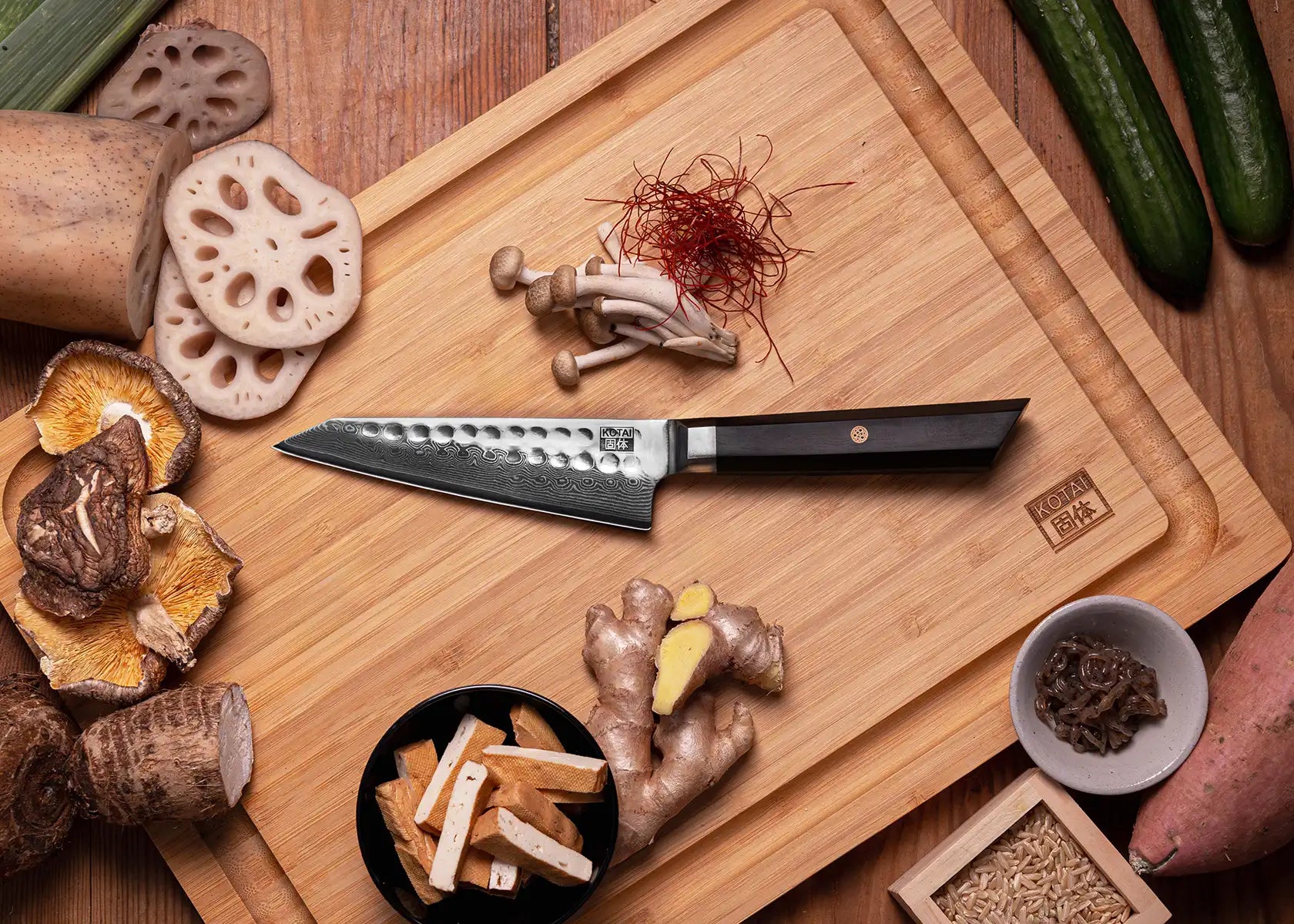 13.5 cm Petty knife with AUS-10 Damascus blade and ebony handle.