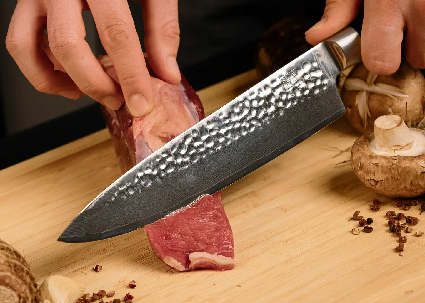 20 cm Gyuto chef knife with AUS-10 Damascus blade and pakkawood handle.