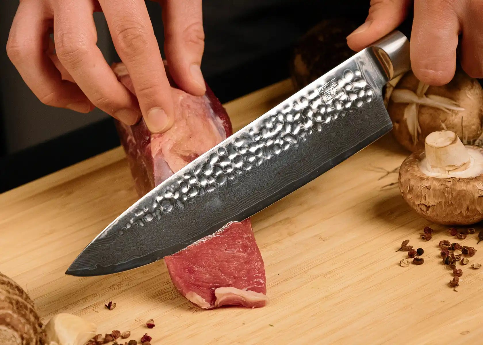 20 cm Gyuto chef knife with AUS-10 Damascus blade and pakkawood handle.
