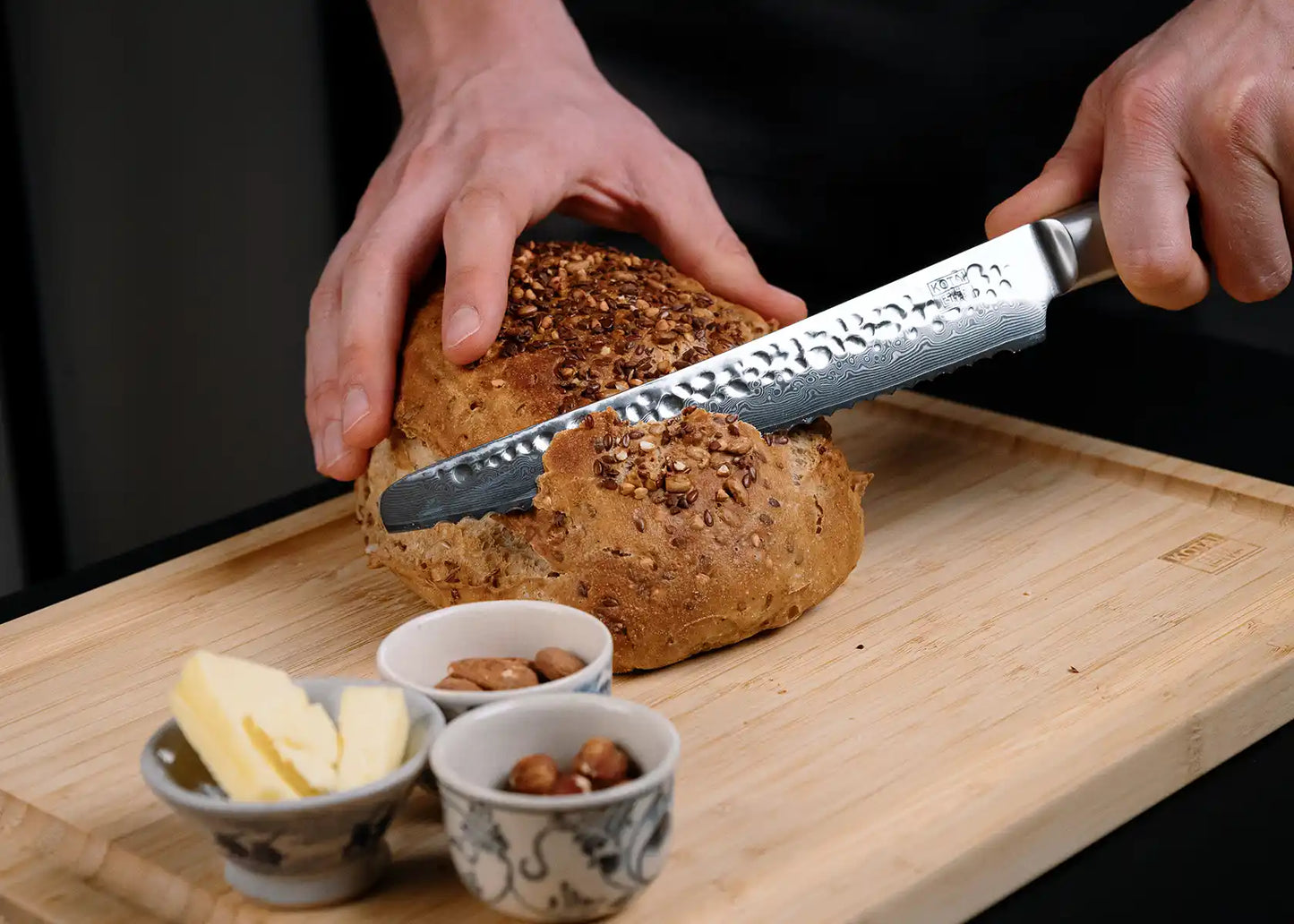 20 cm Serrated Bread knife with 440C blade and pakkawood handle.