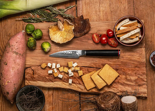 9 cm Paring knife with 440C blade and black pakkawood handle.