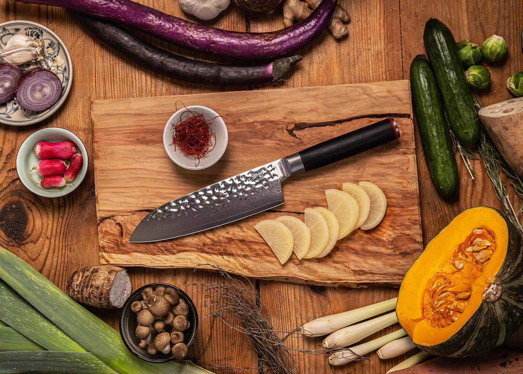 18 cm Santoku knife with 440C blade and black pakkawood handle.