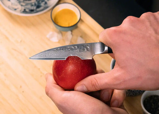 5-Piece Essential Pakka Damascus knife set with patterned AUS-10 blades and pakkawood handles.