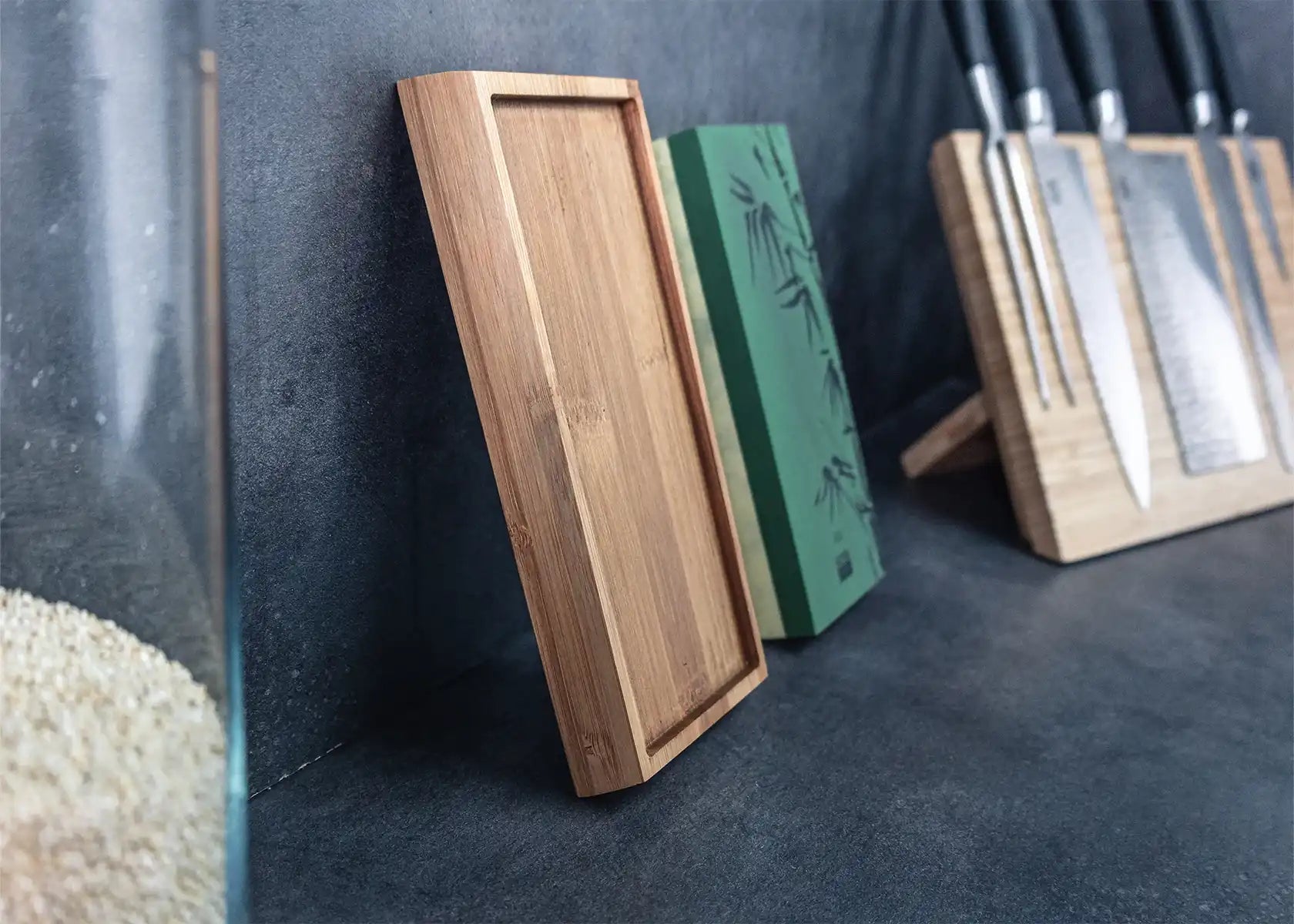 Dual-grit water stone sharpener (180/800) with bamboo base and guide.