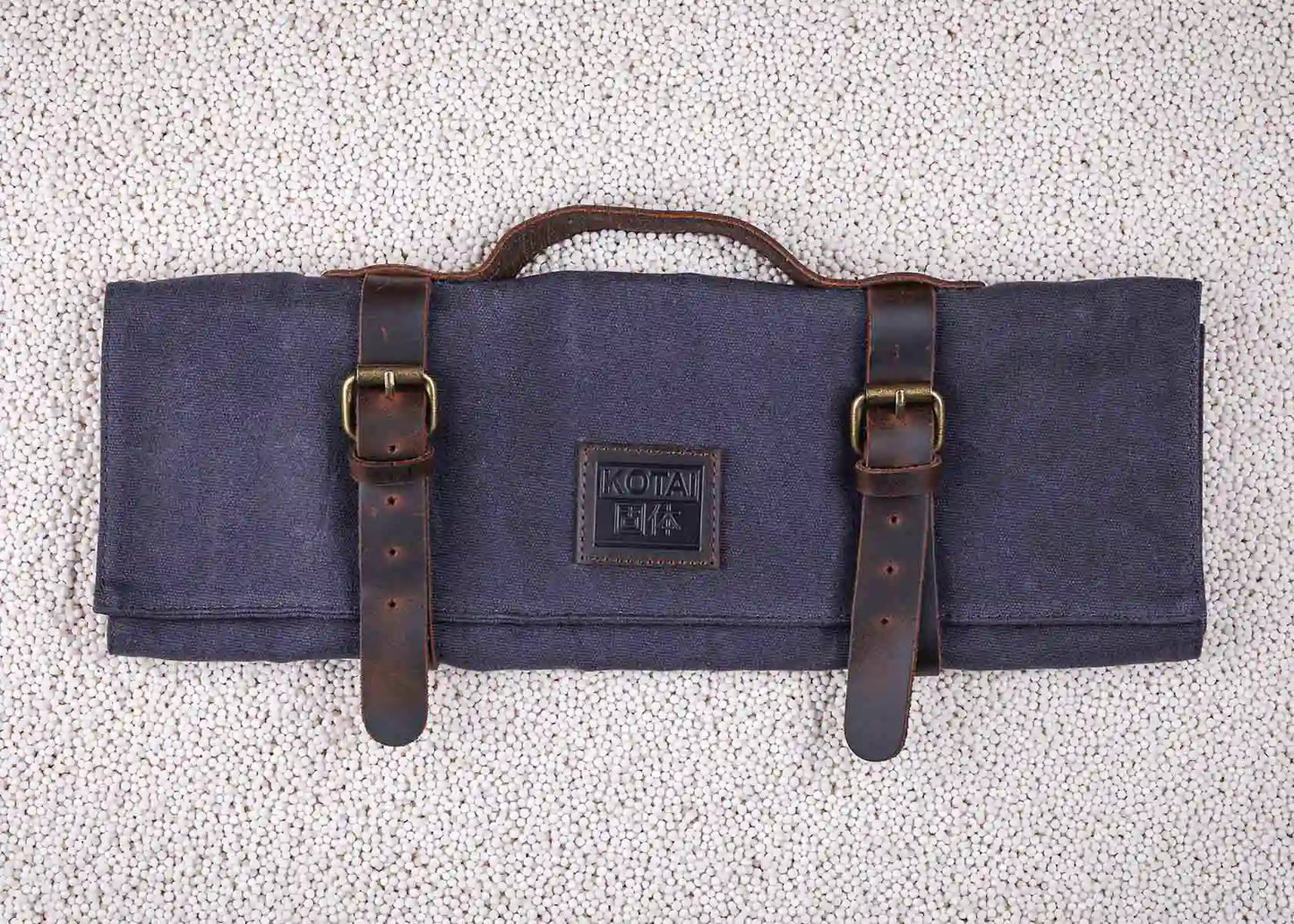 Canvas and leather roll-up knife bag for up to seven knives and steel.