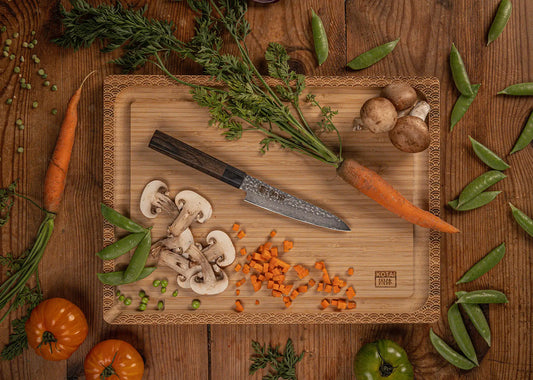130 mm petty knife with VG-10 Damascus blade and octagonal pakkawood handle.