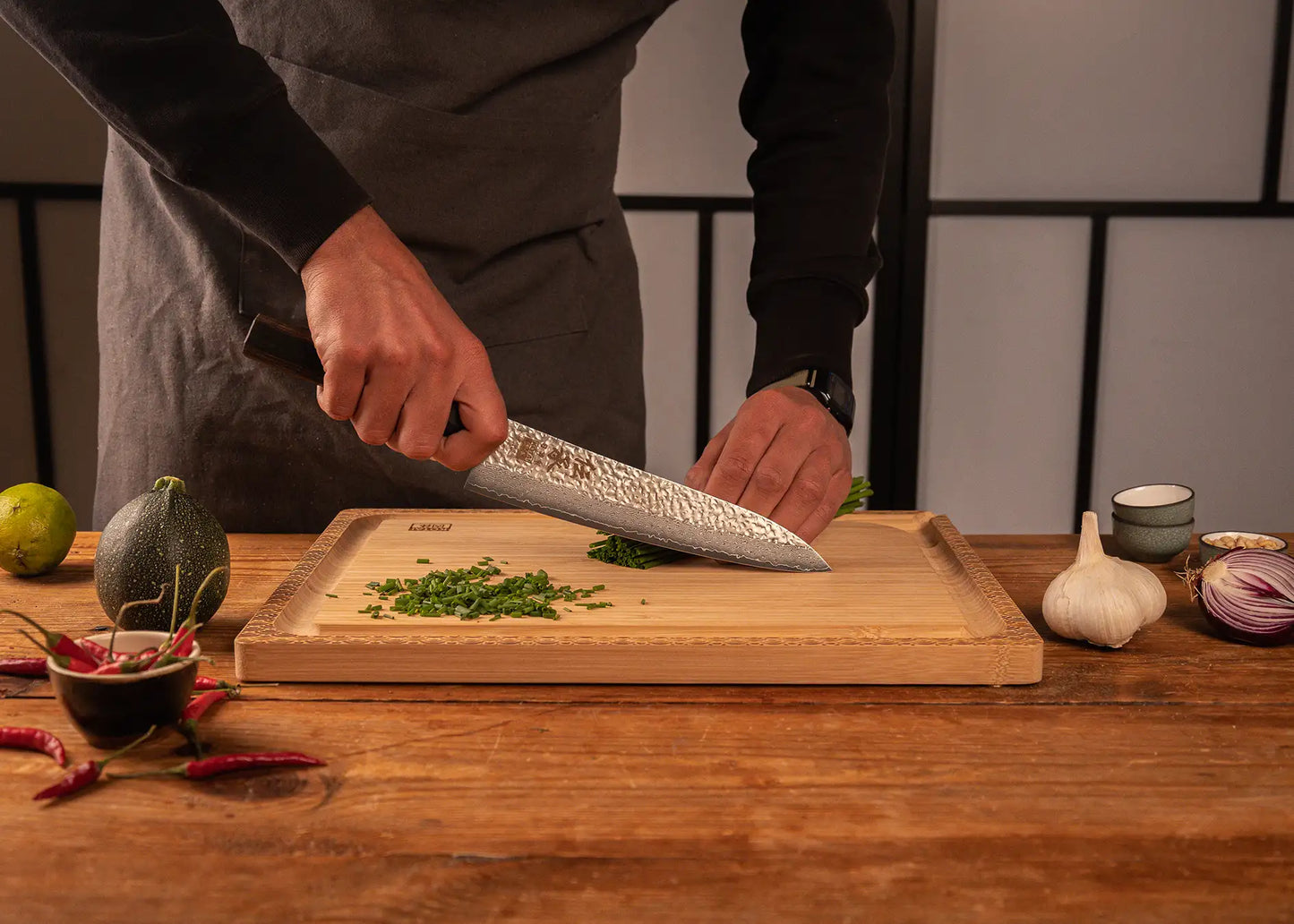 210 mm chef Gyuto knife with VG-10 Damascus blade and pakkawood handle.