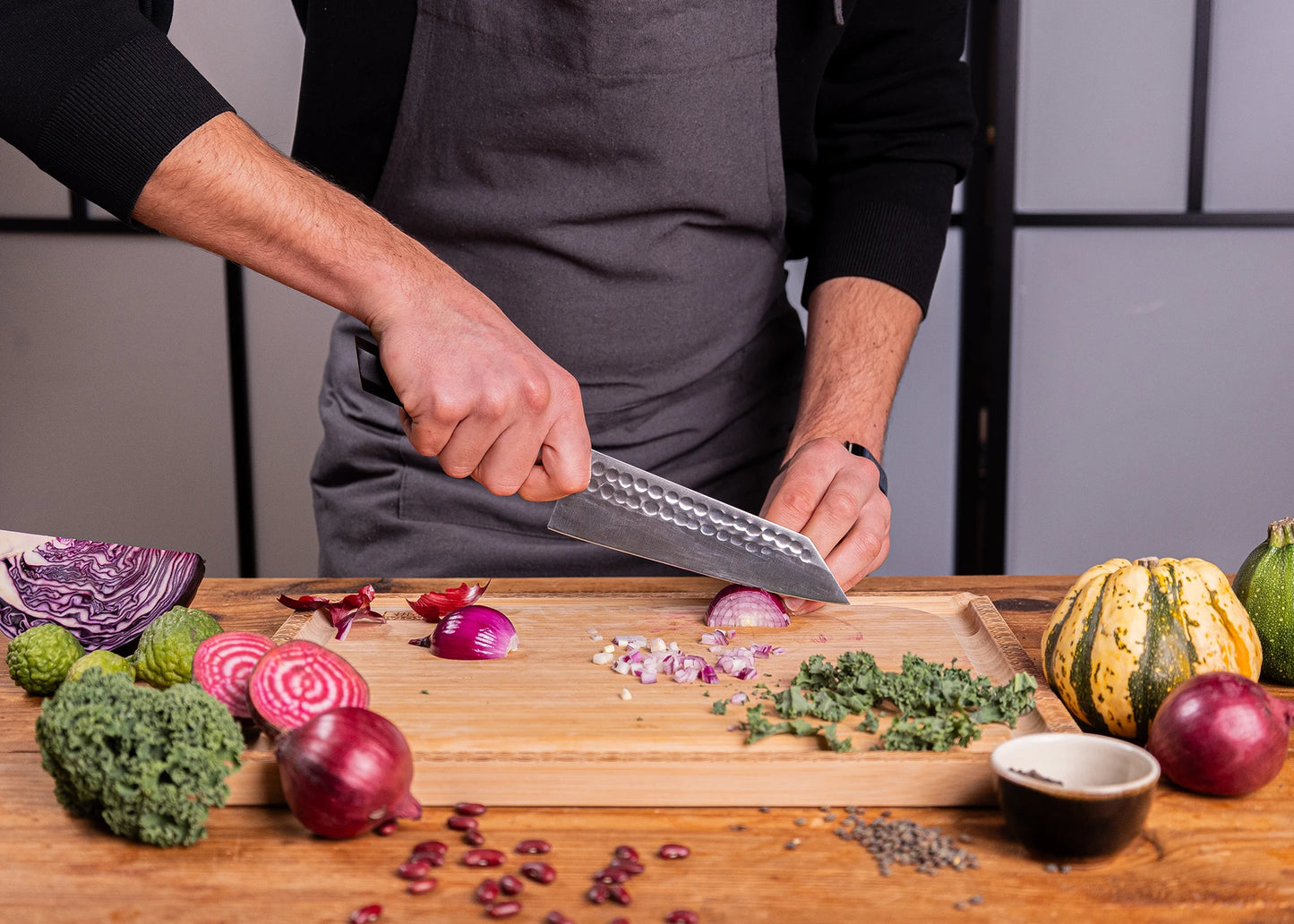 17 cm Santoku knife made of 440C steel with ebony handle.