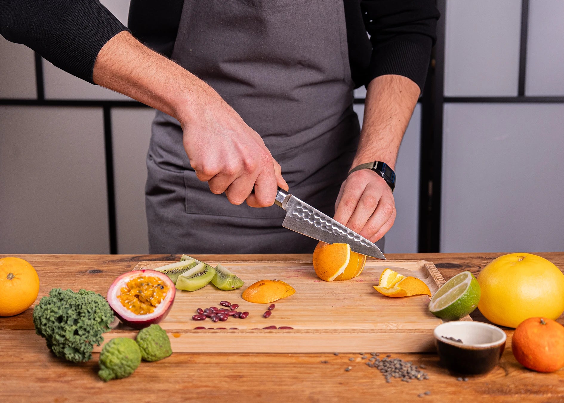 13.5 cm petty knife crafted from 440C steel with ebony handle.