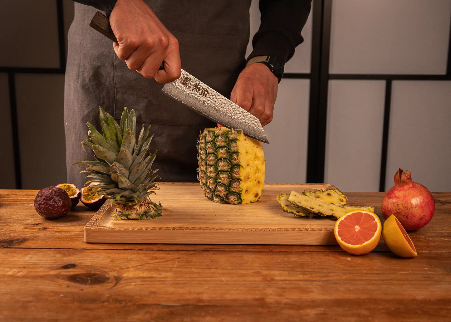 190 mm Kiritsuke knife with VG-10 Damascus blade and octagonal pakkawood handle.