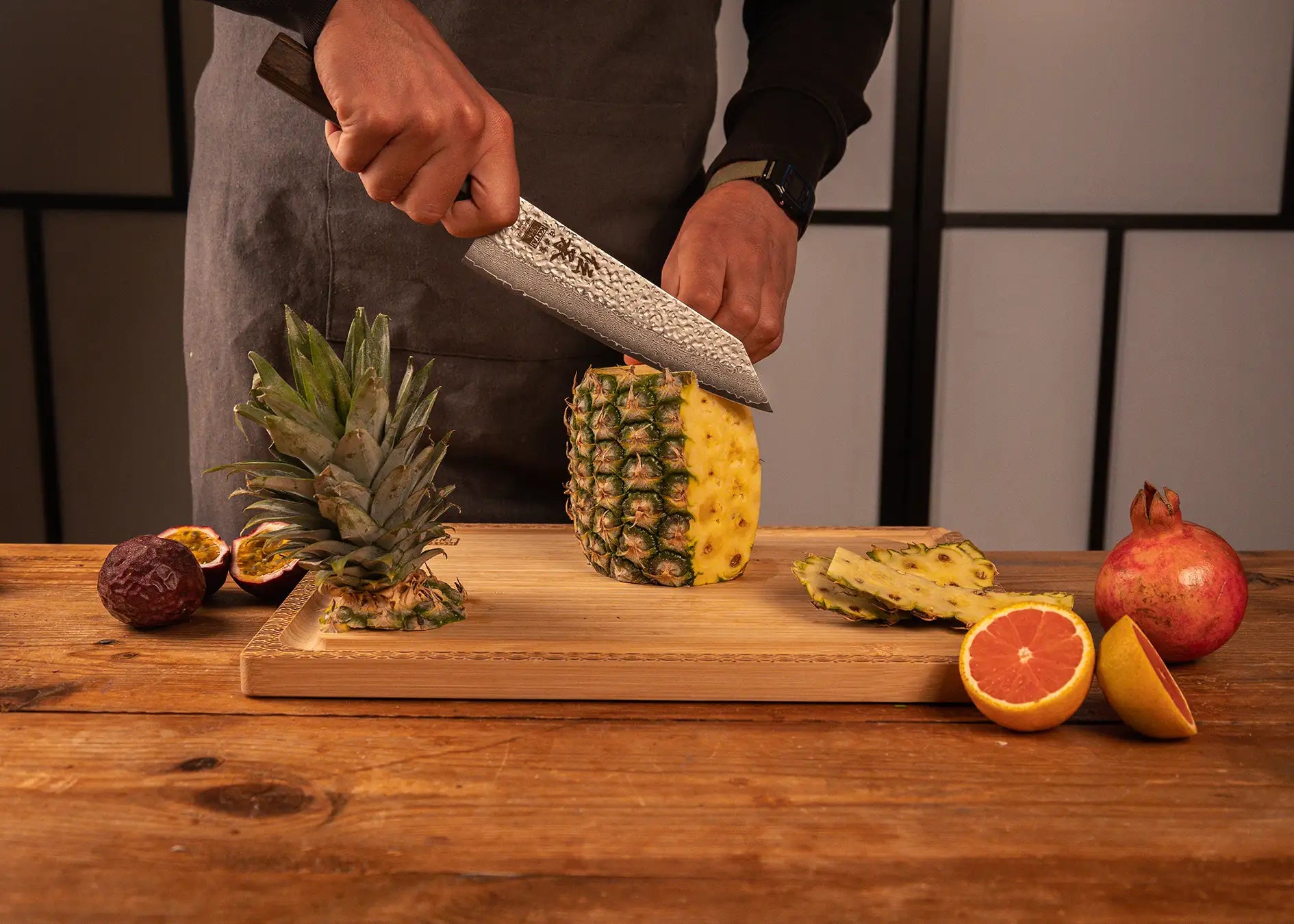 190 mm Kiritsuke knife with VG-10 Damascus blade and octagonal pakkawood handle.