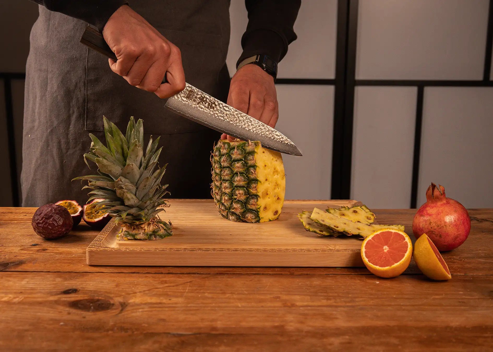 210 mm chef Gyuto knife with VG-10 Damascus blade and pakkawood handle.