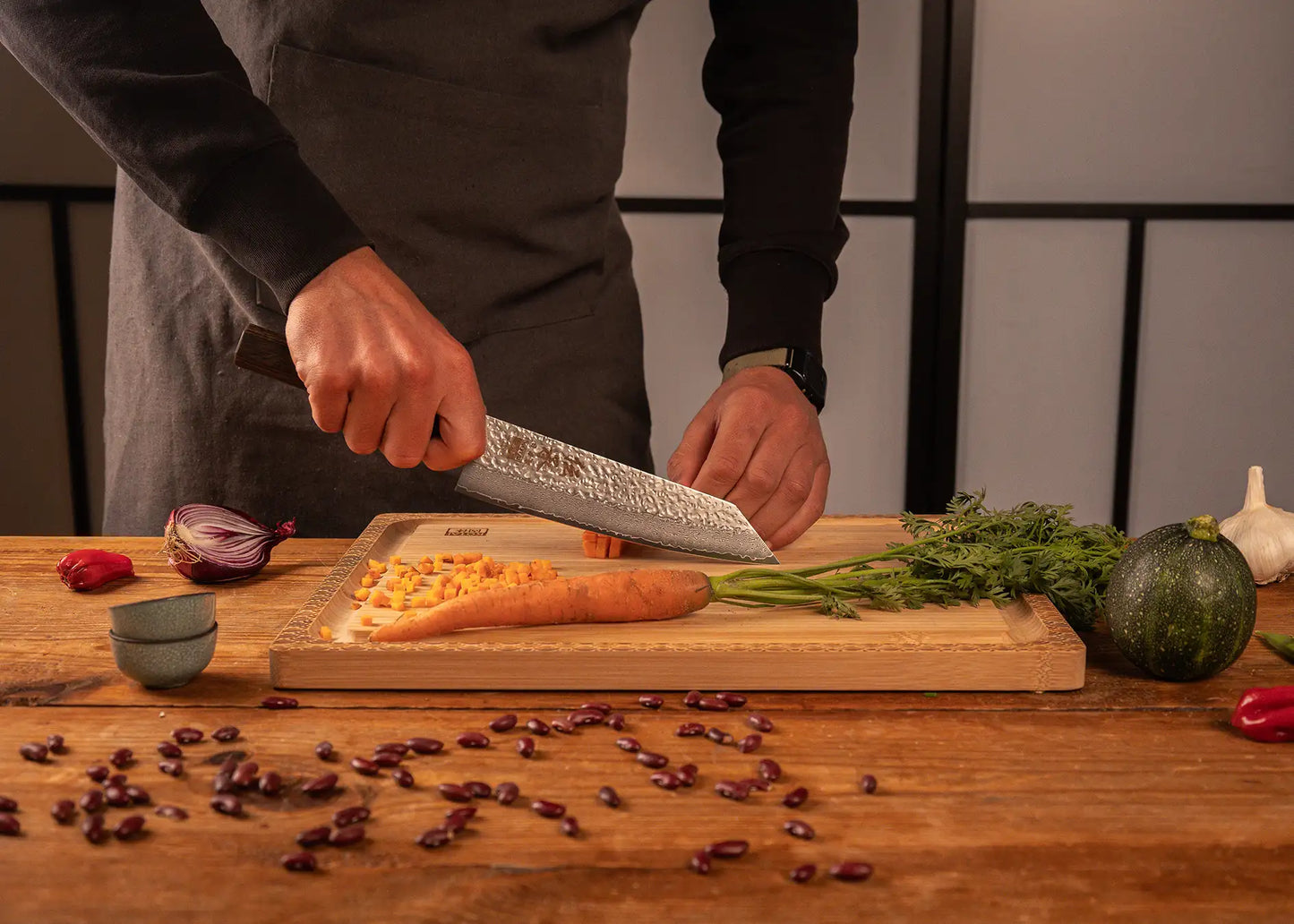 190 mm Kiritsuke knife with VG-10 Damascus blade and octagonal pakkawood handle.
