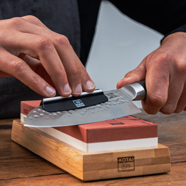 process of sharpening a knife with the kotai's whetstone grit 2000/6000