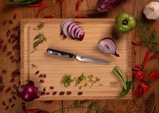 120 mm petty knife with MVS10Cob Damascus blade and pakkawood handle.