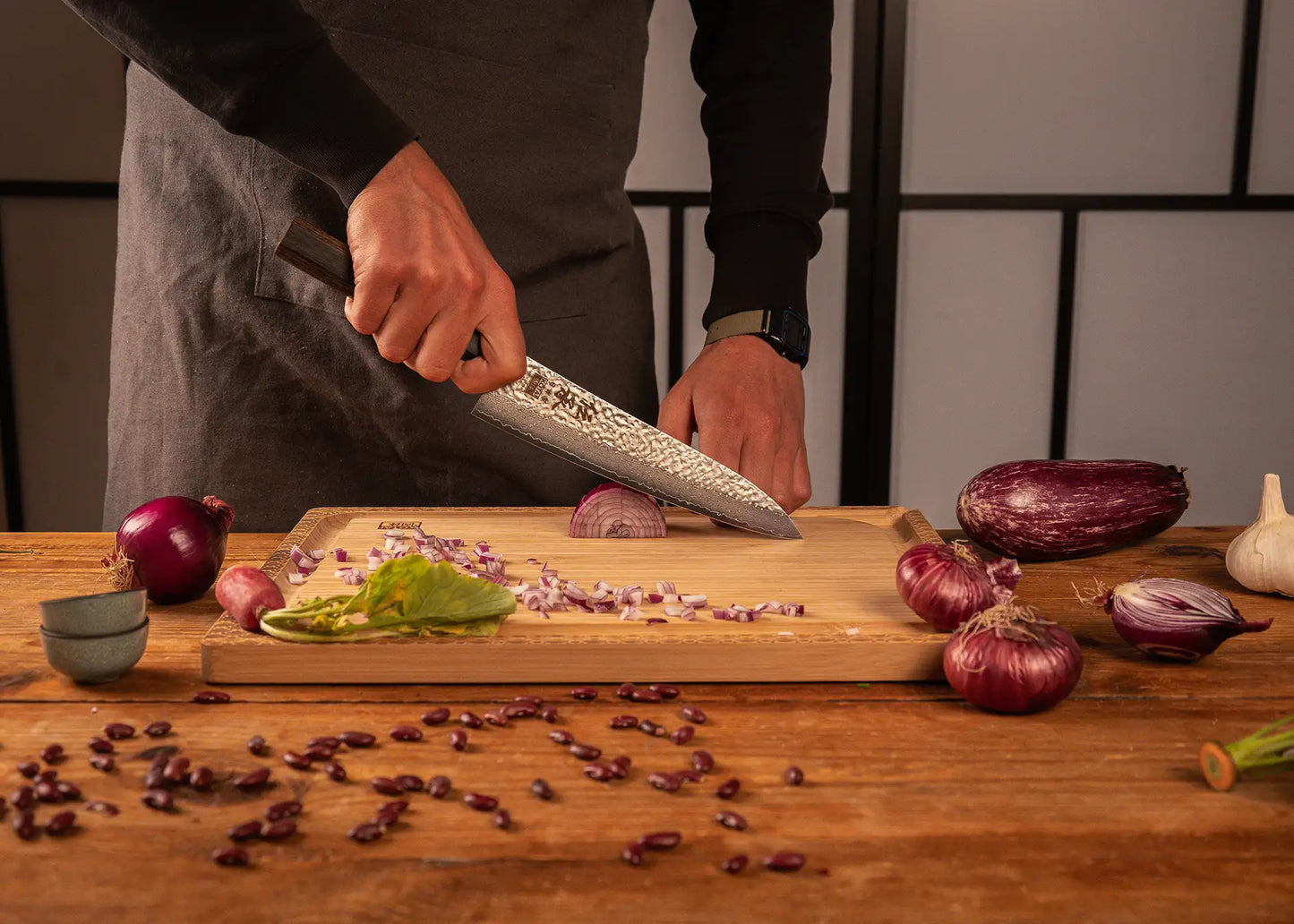 210 mm chef Gyuto knife with VG-10 Damascus blade and pakkawood handle.