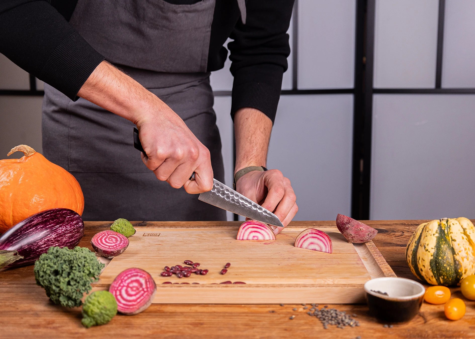 13.5 cm petty knife crafted from 440C steel with ebony handle.