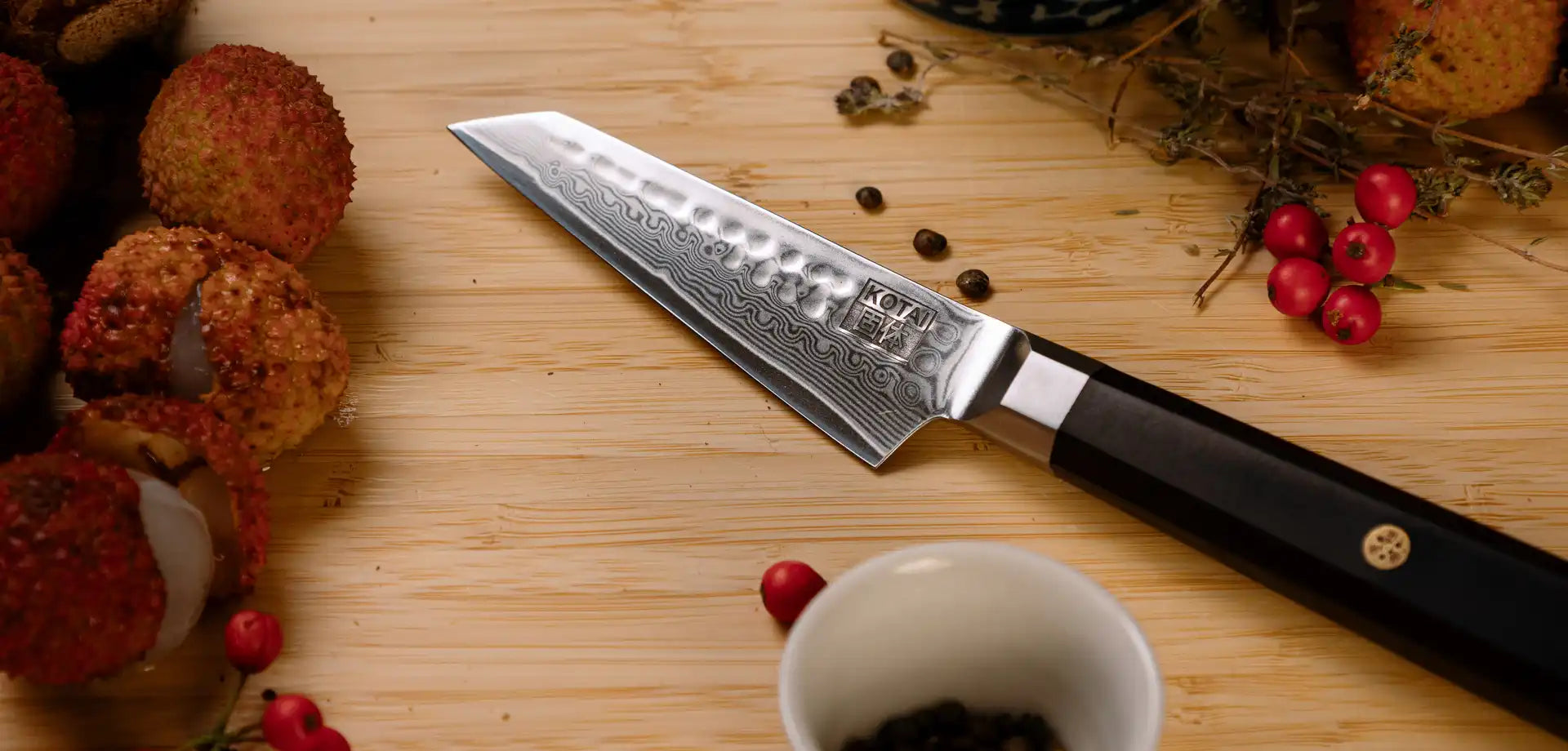 13.5 cm petty knife in Damascus AUS-10 steel, ebony handle.