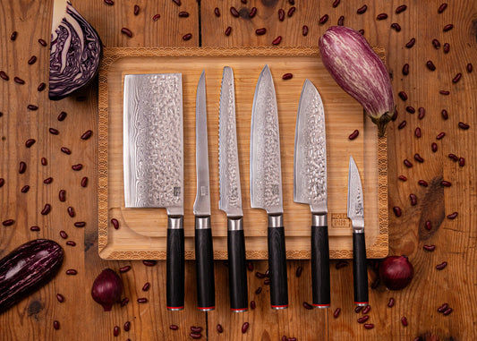 8-Piece Complete Pakka Damascus knife set with patterned AUS-10 blades and pakkawood handles.