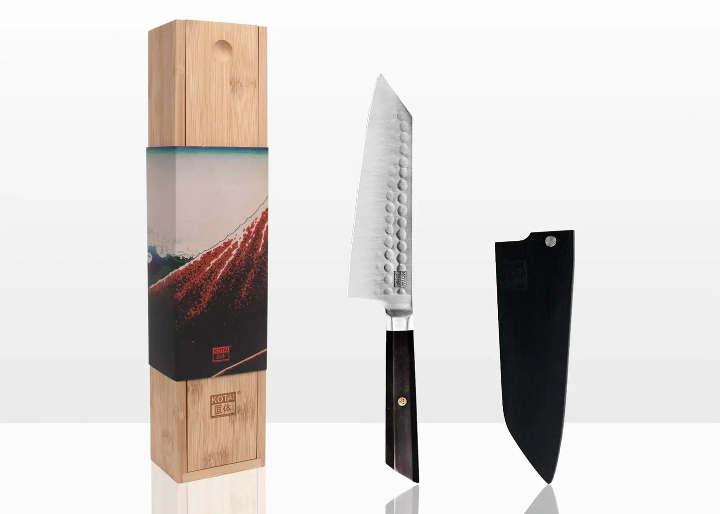 17 cm Santoku knife made of 440C steel with ebony handle.