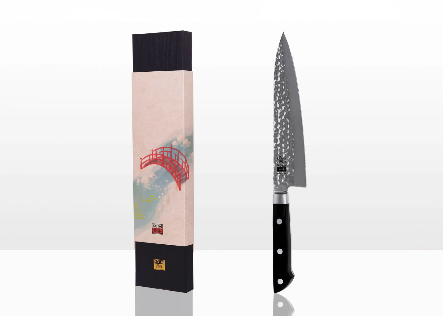 200 mm Gyuto knife with hammered stainless steel blade and ABS handle.