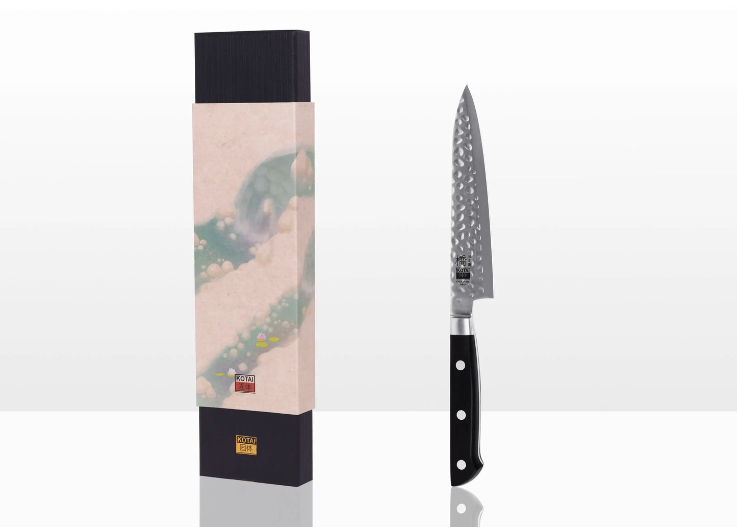 135 mm Hashi Tsuchime Petty knife with hammered stainless steel blade and ABS handle.