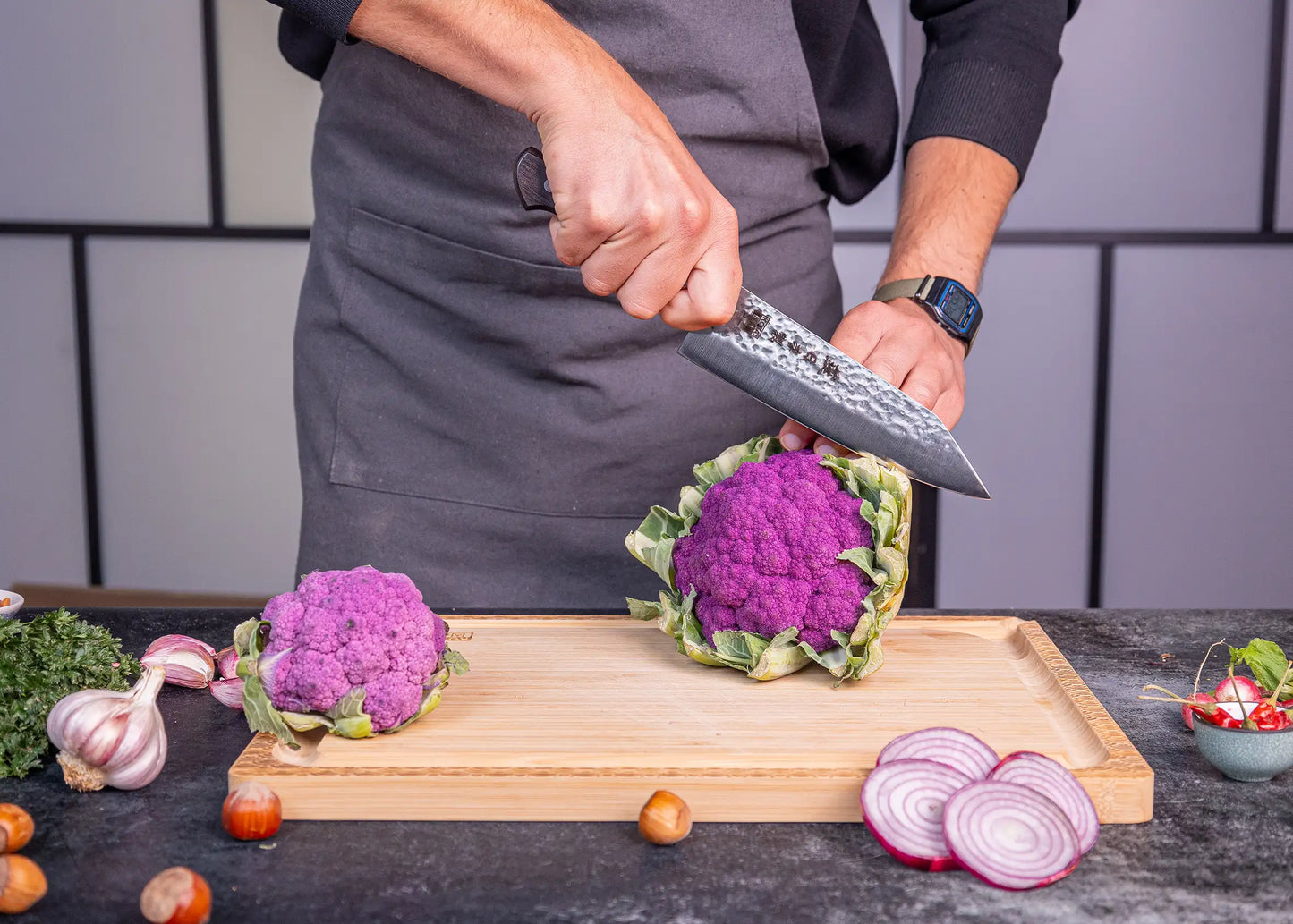 180 mm Santoku knife in 1K6 steel with black pakkawood handle.