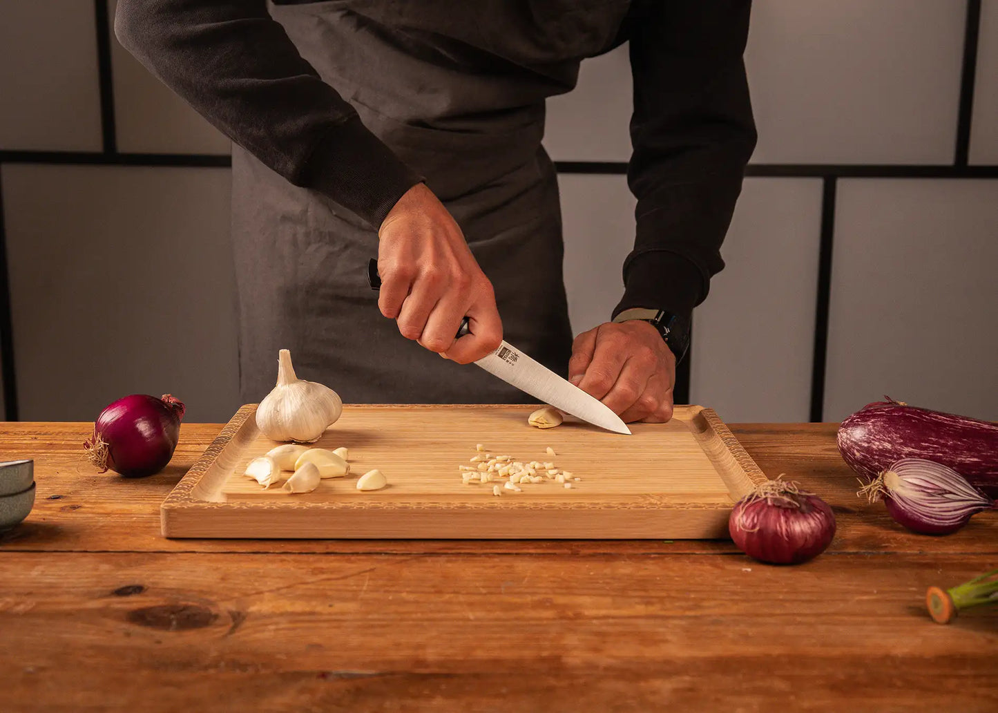 135 mm Hashi Classic Petty knife with molybdenum steel blade and black pakkawood handle.