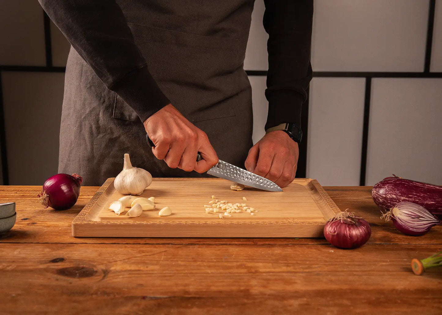 135 mm Hashi Tsuchime Petty knife with hammered stainless steel blade and ABS handle.