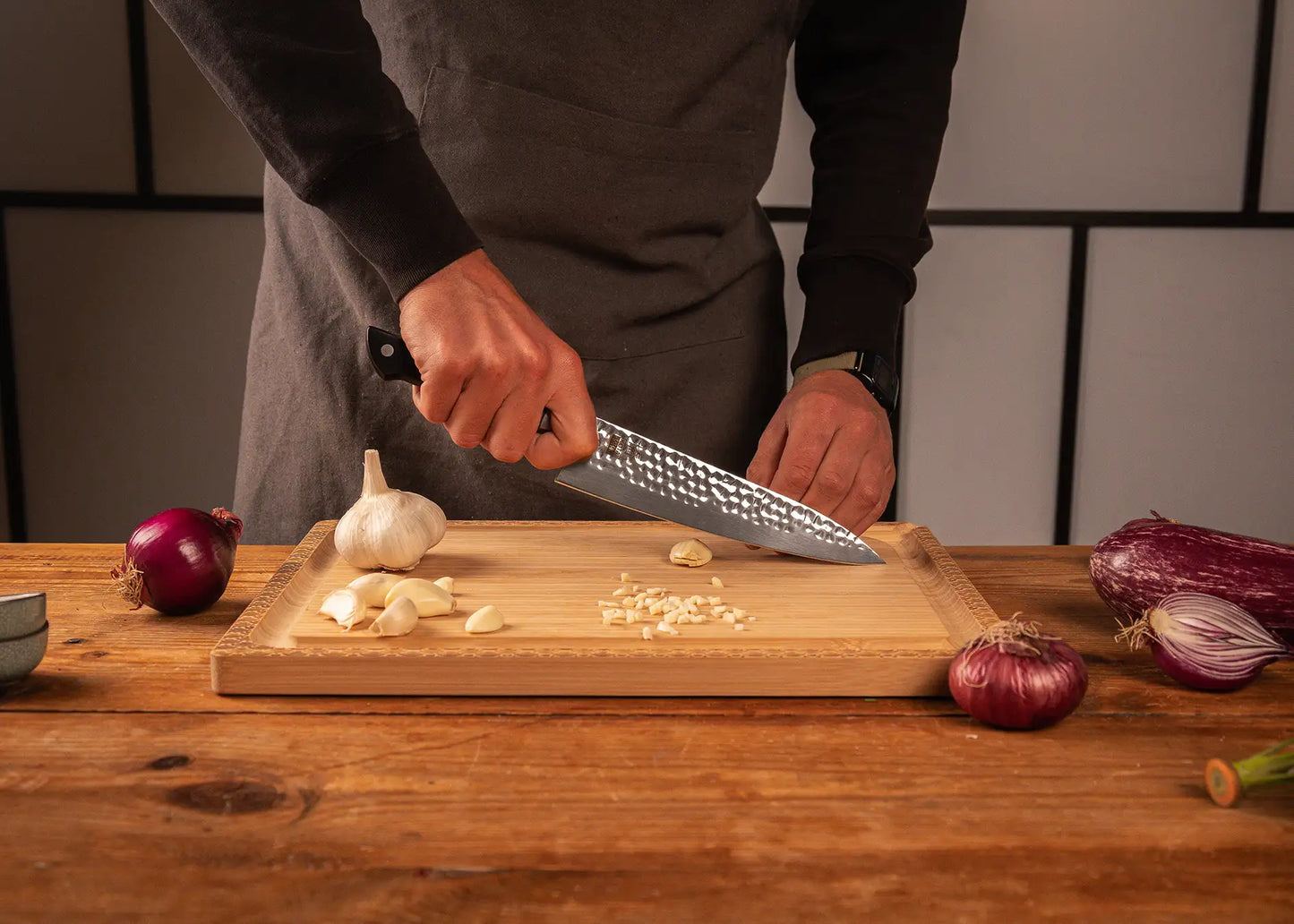 200 mm Gyuto knife with hammered stainless steel blade and ABS handle.
