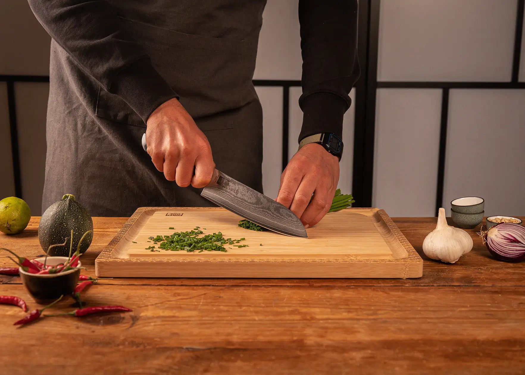 180 mm Santoku knife with MVS10Cob Damascus blade and pakkawood handle.