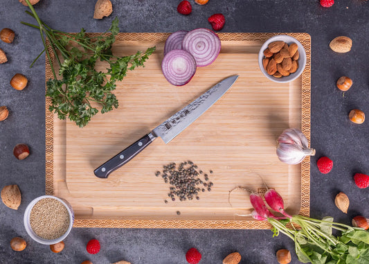 150 mm petty knife in 1K6 steel with black pakkawood handle.