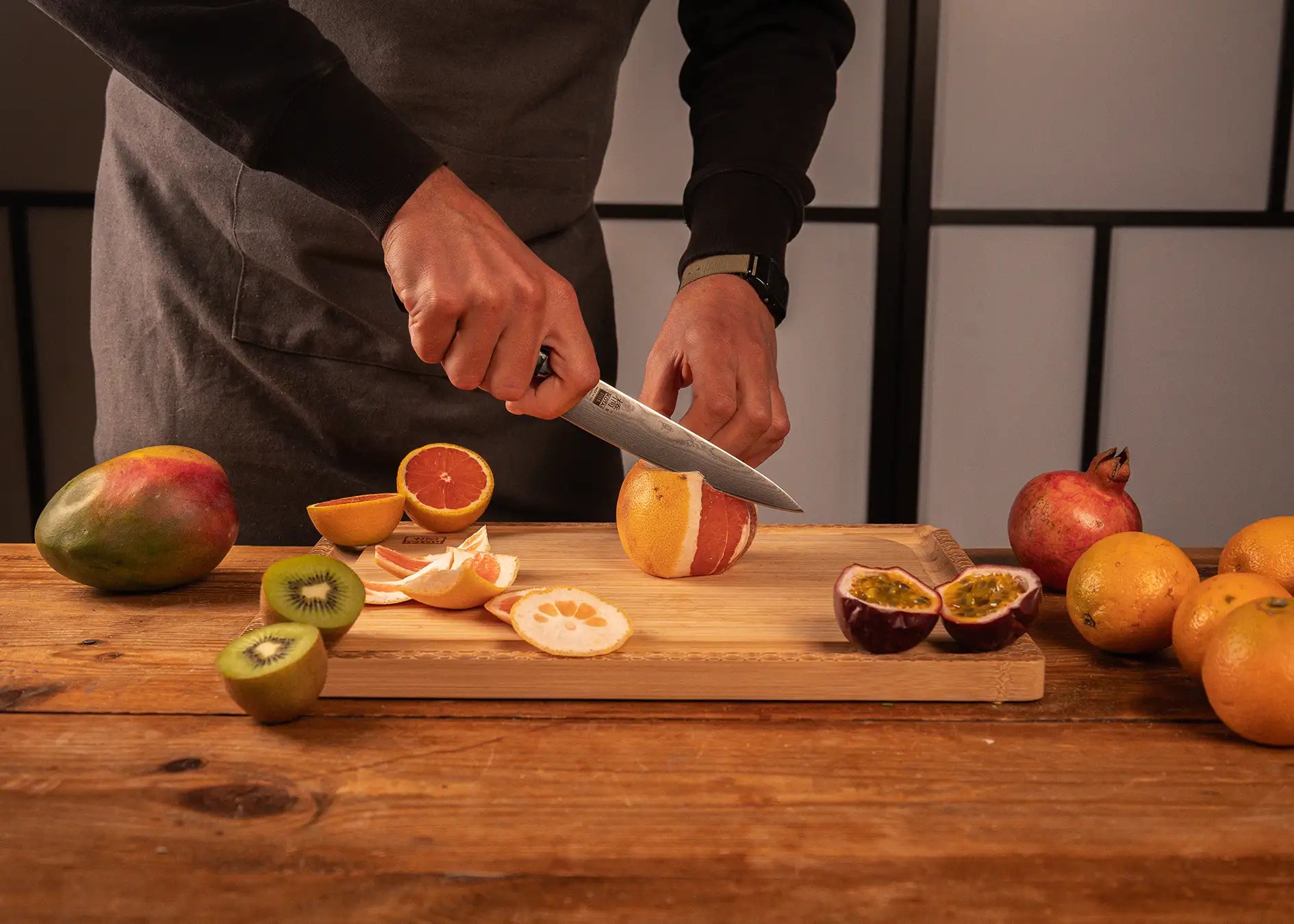 150 mm utility knife with MVS10Cob Damascus blade and pakkawood handle.