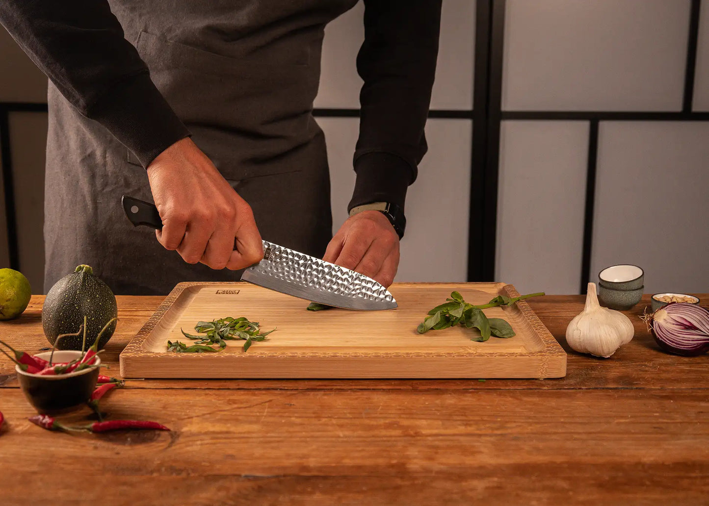 170 mm Santoku knife with hammered stainless steel blade and ABS handle.