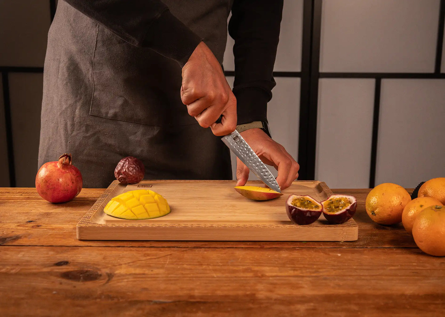 135 mm Hashi Tsuchime Petty knife with hammered stainless steel blade and ABS handle.