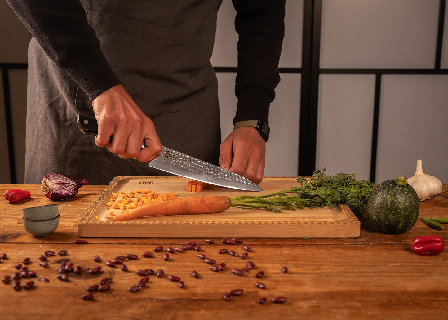 200 mm Gyuto knife with hammered stainless steel blade and ABS handle.