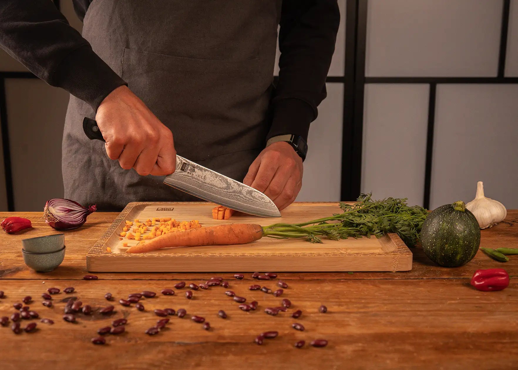 180 mm Santoku knife with MVS10Cob Damascus blade and pakkawood handle.