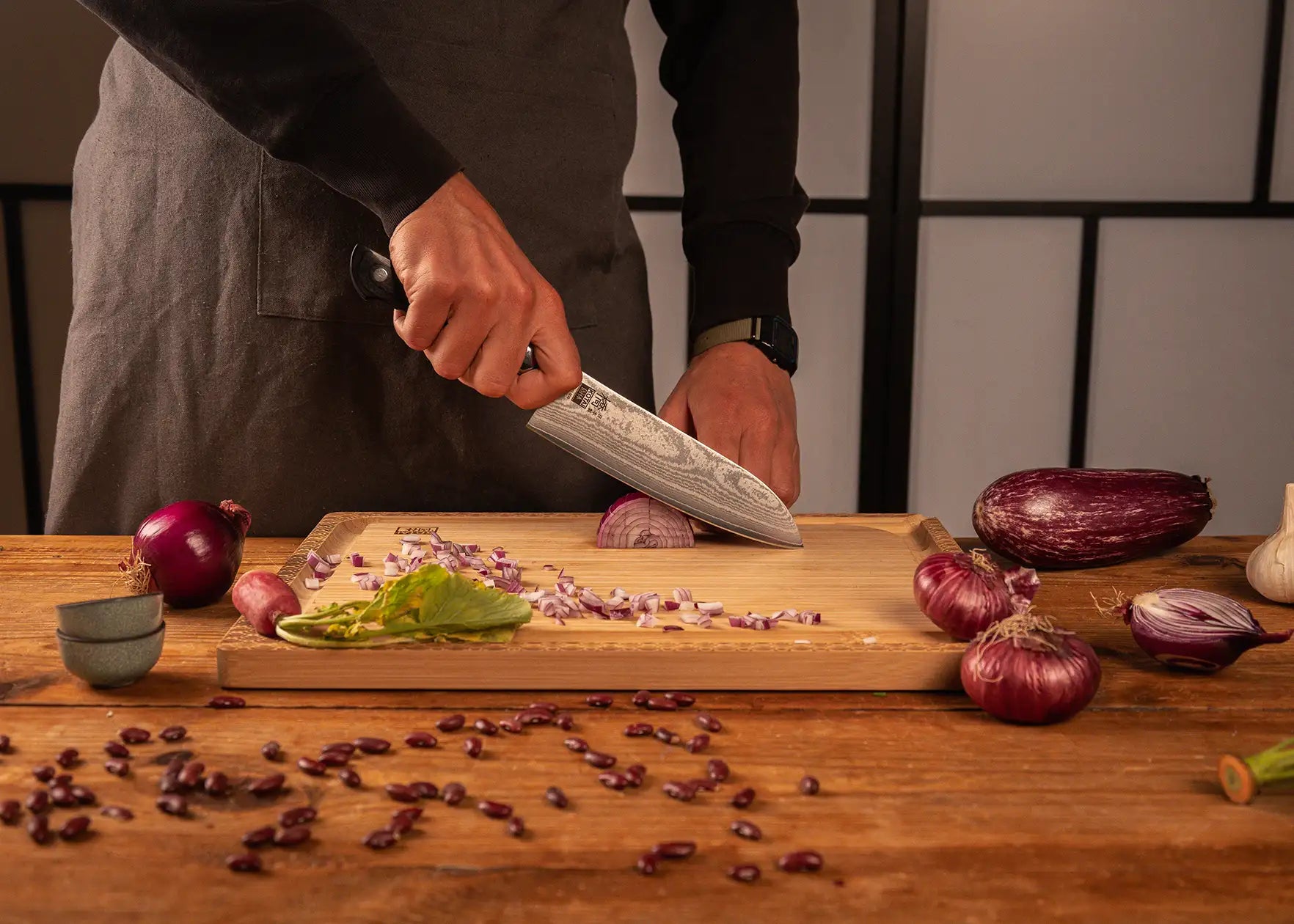 180 mm Santoku knife with MVS10Cob Damascus blade and pakkawood handle.