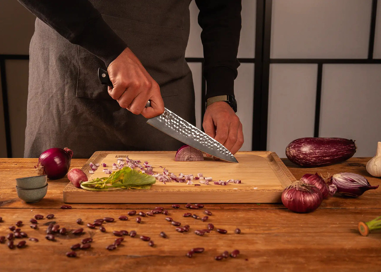 200 mm Gyuto knife with hammered stainless steel blade and ABS handle.