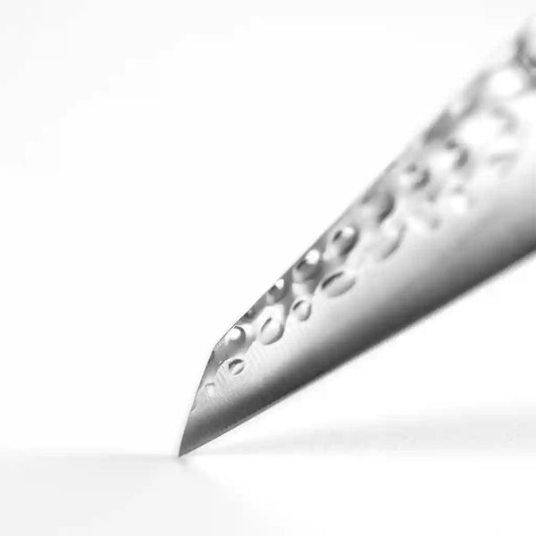 Focused image of KOTAI's blade on white background. 