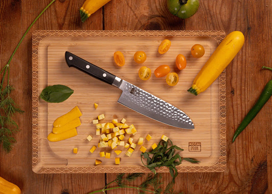 170 mm Santoku knife with hammered stainless steel blade and ABS handle.