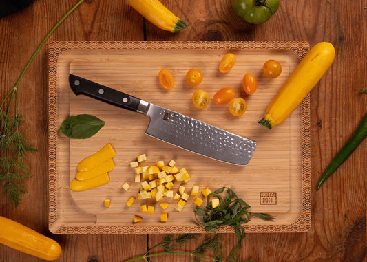 160 mm Hashi Tsuchime Nakiri knife with hammered stainless steel blade and ABS handle.