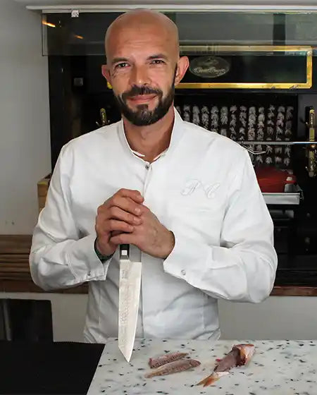 Chef Philippe Colinet with a Kiritsuke KOTAI knife