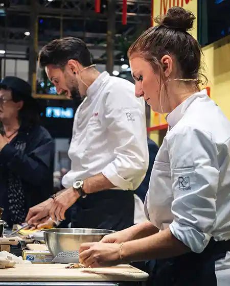 Picture of Chefs Romain Casas & Tiphaine Mollard using our knives.