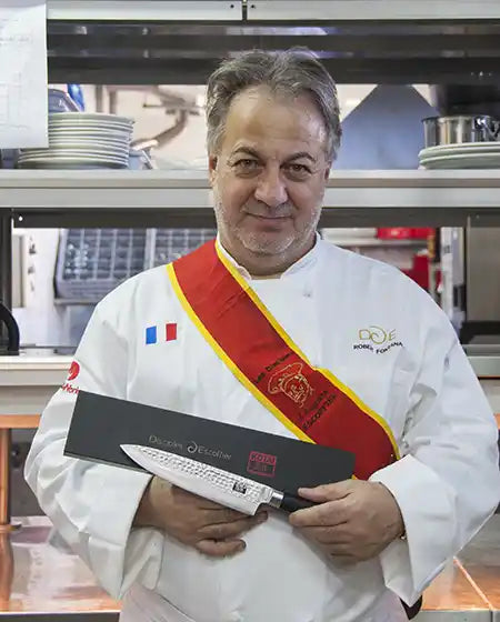 Picture of Robert Fontana with one of our first knives.
